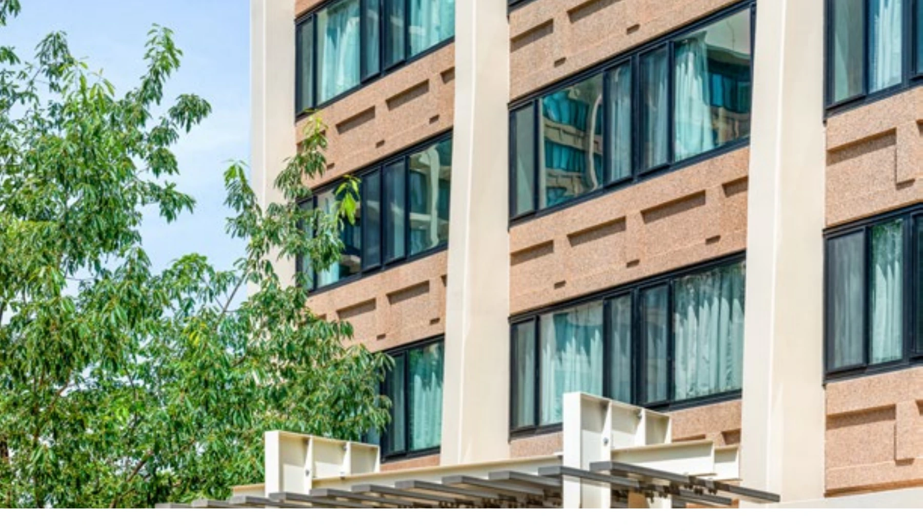 Expansive picture windows bring natural light into the residence hall.